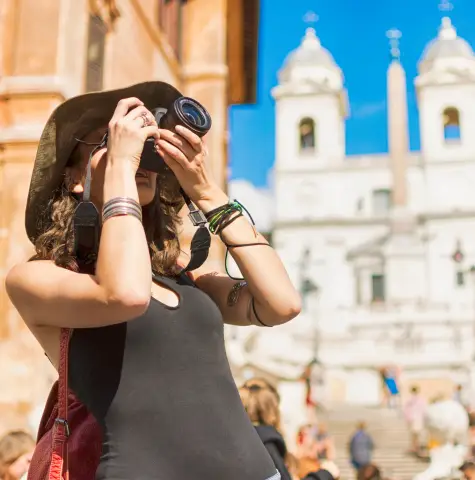 Woman Taking Pictures On a Roadtrip